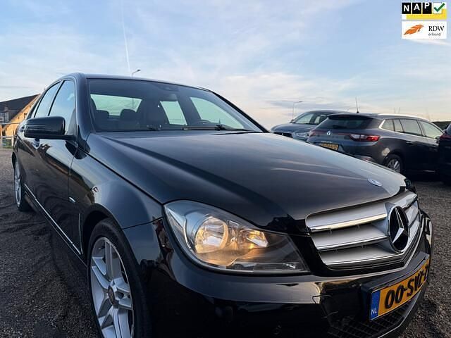 Zwart Gebruikt 2012 Mercedes C180 Avantgarde Sedan | € 9.950 (Eerlijke prijs) - Afbeelding 1/4