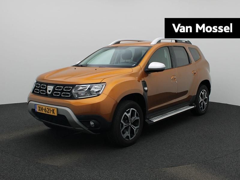 Oranje Gebruikt 2018 Dacia Duster Prestige SUV | € 14.940 (Eerlijke prijs) - Afbeelding 1/4