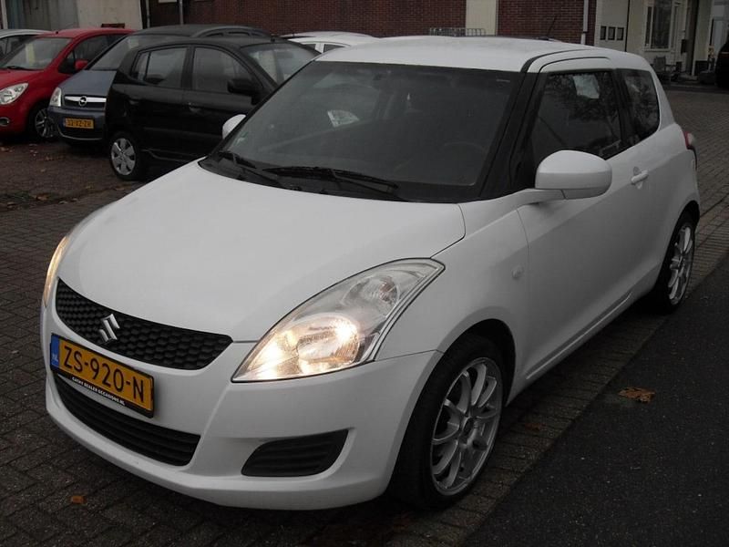 Wit (metallic) Gebruikt 2011 Suzuki Swift Exclusive Hatchback | € 3.950 (Super prijs) - Afbeelding 1/4