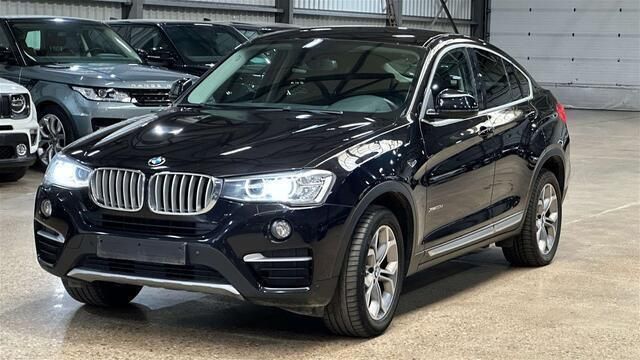 Zwart Gebruikt 2016 BMW X4 SUV | € 18.900 - Afbeelding 1/4