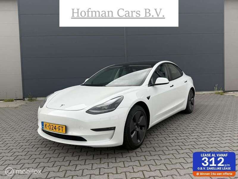 Wit, metallic lak Gebruikt 2020 Tesla Model 3 Long Range Sedan | € 23.300 (Eerlijke prijs) - Afbeelding 1/4