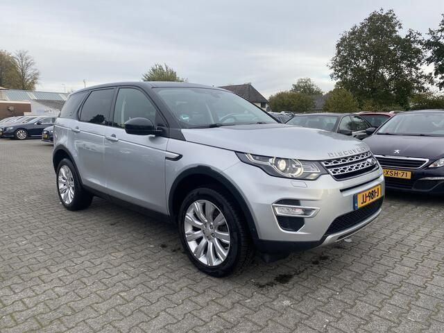 Rhodium silver/indus silver (grijs metallic) Gebruikt 2016 Land Rover Discovery Sport HSE Luxury SUV | € 11.445 (Goede deal) - Afbeelding 1/4