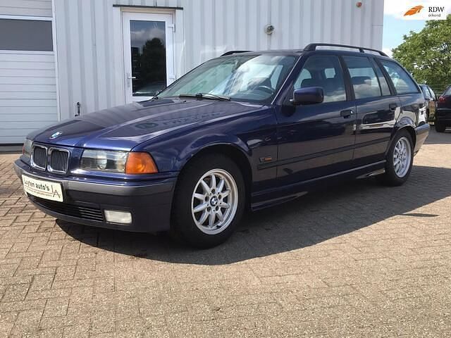 Blauw Gebruikt 1996 BMW 323 Executive Stationwagen | € 4.750 - Afbeelding 1/4