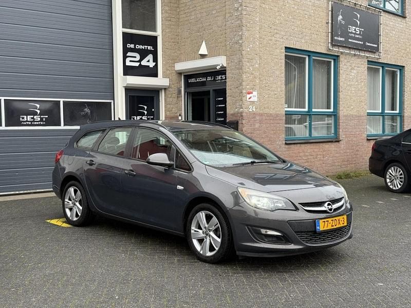 Grijs Gebruikt 2012 Opel Astra Sport Stationwagen | € 3.450 (Super prijs) - Afbeelding 1/4