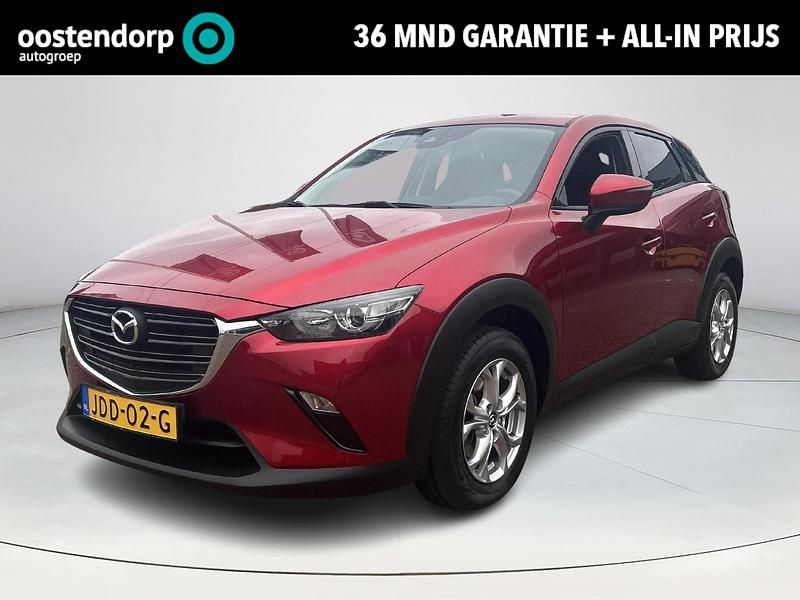 Soul red crystal metallic (46v) Gebruikt 2021 Mazda CX-3 Comfort SUV | € 21.880 (Eerlijke prijs) - Afbeelding 1/4