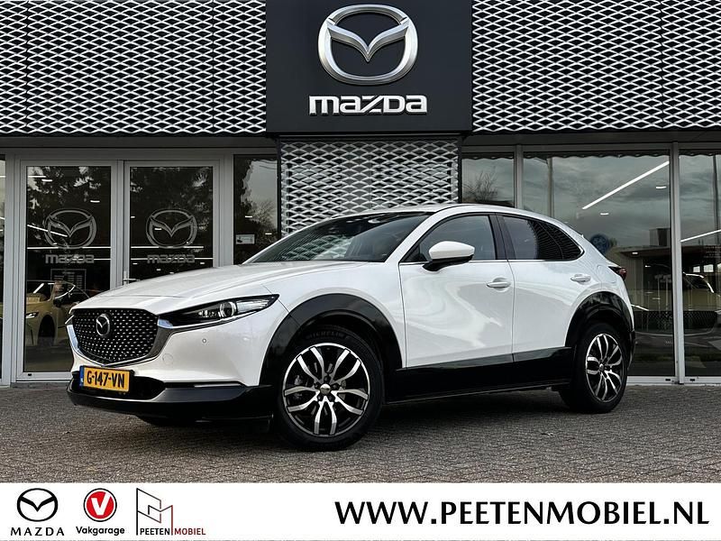 Snowflake white pearl Gebruikt 2019 Mazda CX-30 Luxury SUV | € 22.400 (Iets duurder) - Afbeelding 1/2
