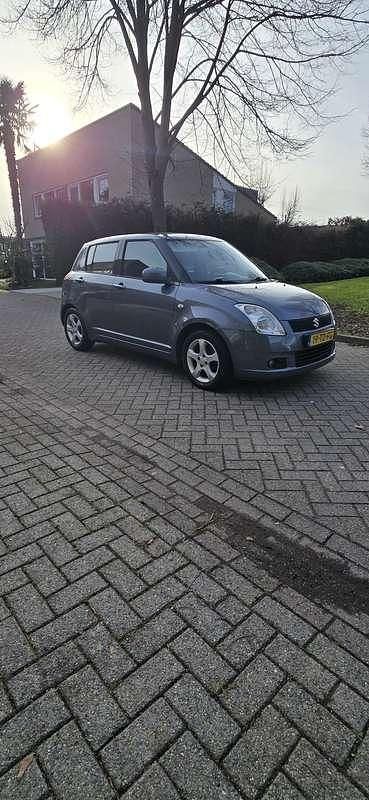 Occasion Suzuki Swift 92 PK (67 kW) 2006 Grijs Hatchback
