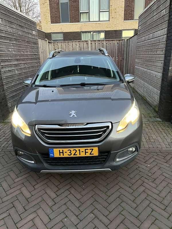 Grijs Gebruikt 2015 Peugeot 2008 Allure SUV | € 6.500 (Super prijs) - Afbeelding 1/4
