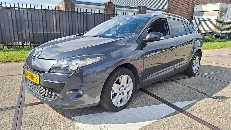 Grijs Occasion 2011 Renault Mégane GrandTour Stationwagen | € 2.695 (Eerlijke prijs) - Afbeelding 1/4