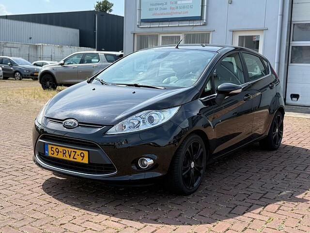 Zwart Gebruikt 2011 Ford Fiesta Titanium Hatchback | € 2.500 (Duur) - Afbeelding 1/4