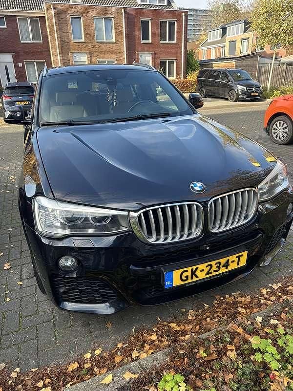 Zwart Gebruikt 2015 BMW X4 SUV | € 21.000 (Eerlijke prijs) - Afbeelding 1/4