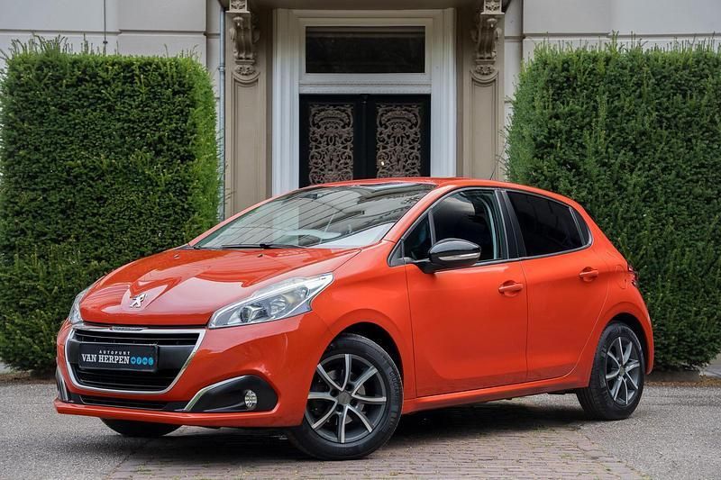 Oranje Gebruikt 2018 Peugeot 208 Hatchback | € 9.935 (Eerlijke prijs) - Afbeelding 1/4