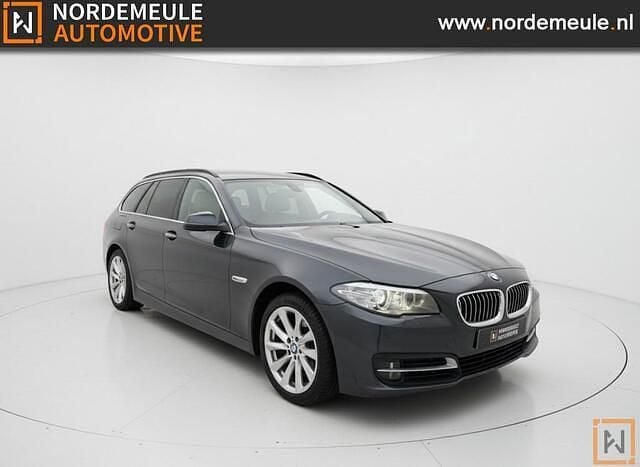 Grijs Occasion 2016 BMW 518 Executive Stationwagen | € 6.500 (Super prijs) - Afbeelding 1/4