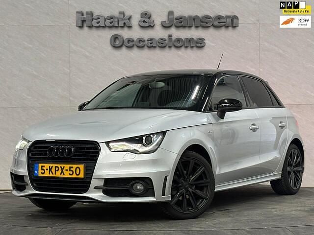 Grijs Gebruikt 2013 Audi A1 Sportback Admired Hatchback | € 7.995 (Goede deal) - Afbeelding 1/4