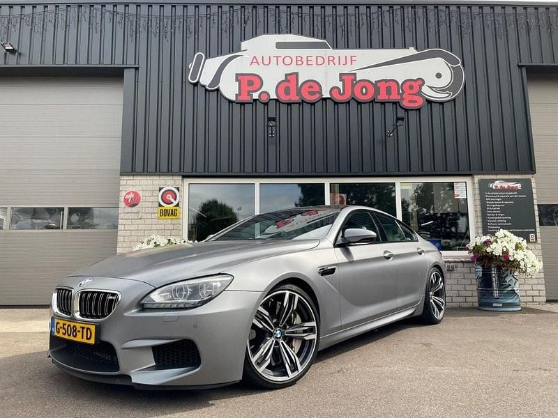 Grijs, metallic lak Gebruikt 2013 BMW M6 Comfort Edition Coupé | € 42.975 - Afbeelding 1/4