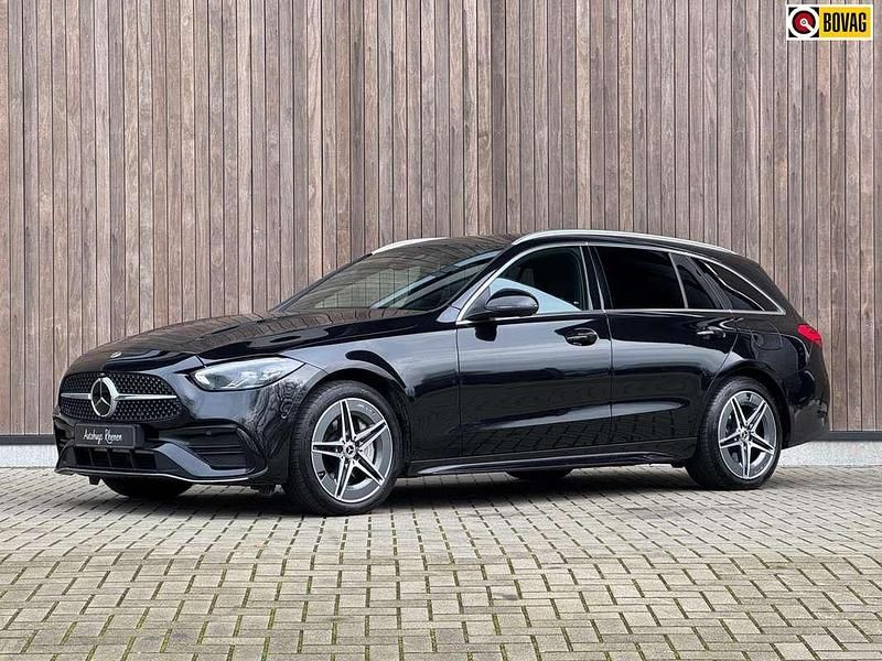 Zwart, metallic lak Gebruikt 2024 Mercedes C300e AMG line Stationwagen | € 45.900 (Super prijs) - Afbeelding 1/4