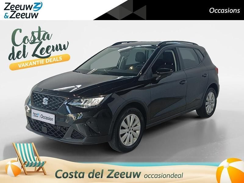 Metallic mythical black (donker zwart) Gebruikt 2023 Seat Arona Business SUV | € 17.935 (Eerlijke prijs) - Afbeelding 1/4