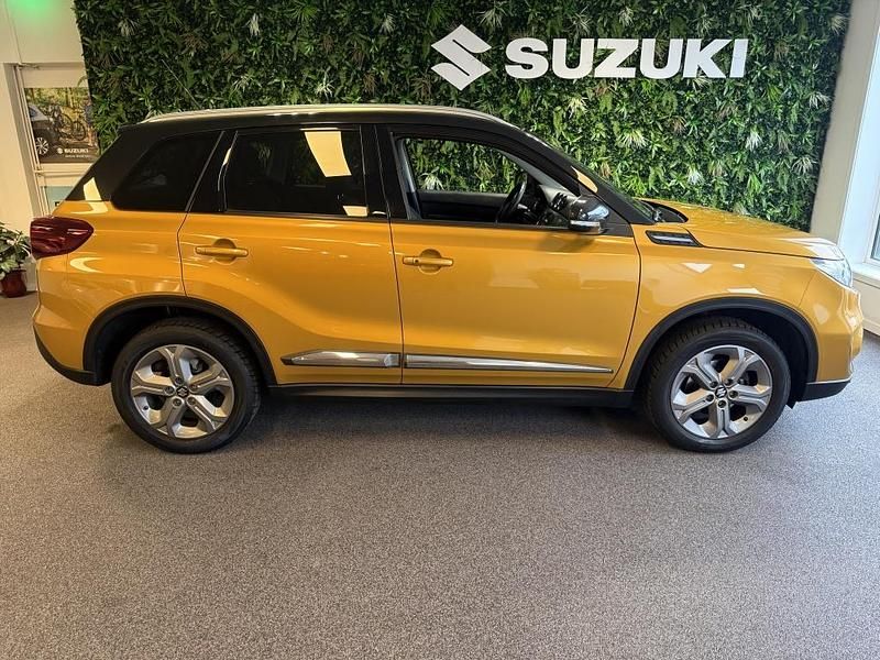 Geel Occasion 2019 Suzuki Vitara SUV | € 17.500 (Eerlijke prijs) - Afbeelding 1/4