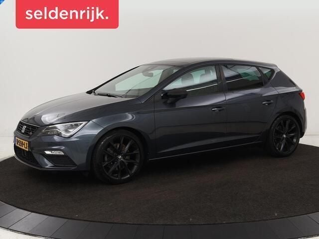 Grijs Gebruikt 2020 Seat Leon Beats Hatchback | € 17.900 (Eerlijke prijs) - Afbeelding 1/4