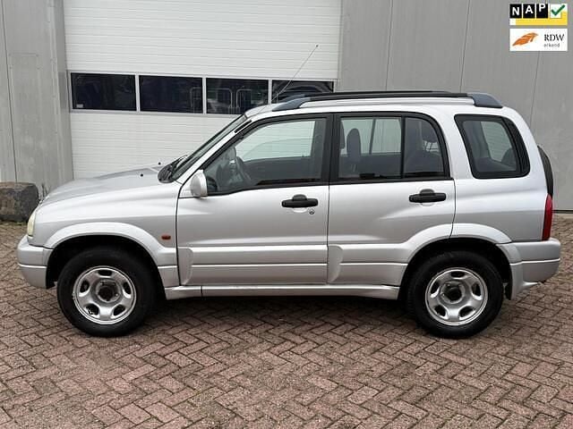 Grijs Gebruikt 2004 Suzuki Grand Vitara SUV | € 4.450 (Goede deal) - Afbeelding 1/4