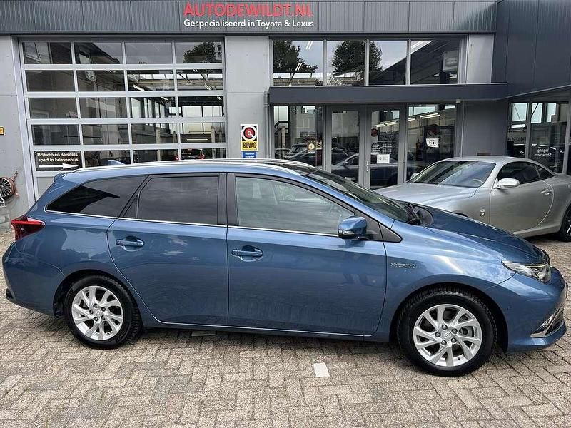 Blauw, metallic lak Gebruikt 2015 Toyota Auris Stationwagen | € 11.950 (Eerlijke prijs) - Afbeelding 1/4
