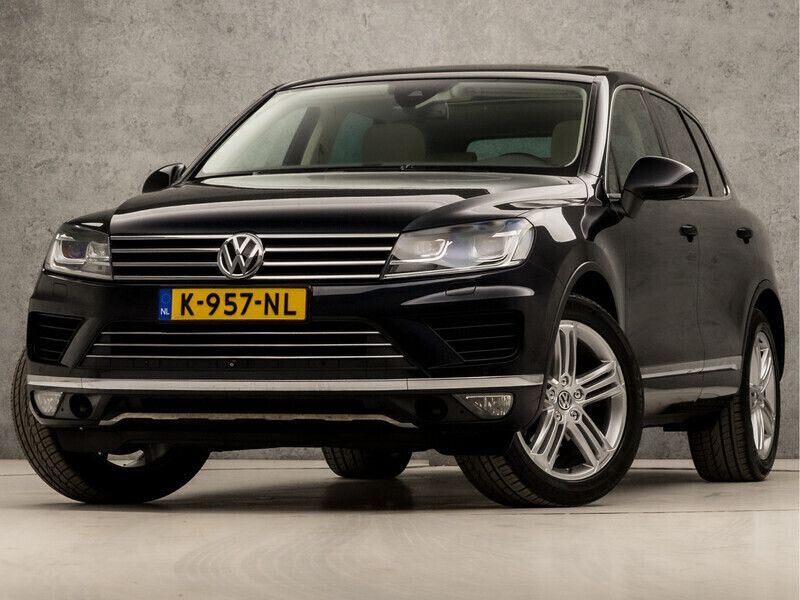Blauw Gebruikt 2015 VW Touareg Sport SUV | € 29.445 - Afbeelding 1/4