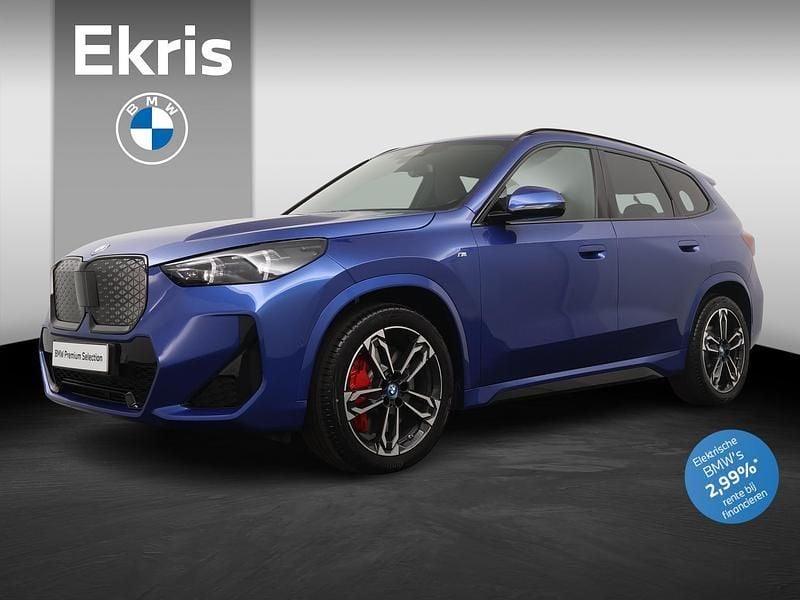 Blauw Gebruikt 2025 BMW iX1 M Sport SUV | € 46.900 (Eerlijke prijs) - Afbeelding 1/4