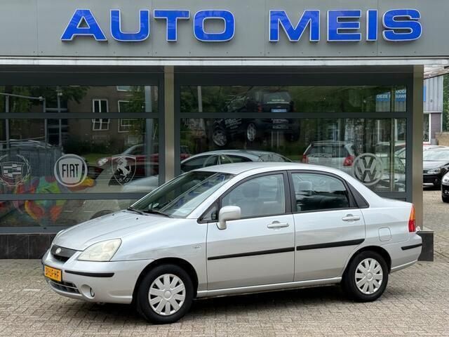 Grijs Gebruikt 2002 Suzuki Liana GLX Sedan | € 1.995 (Eerlijke prijs) - Afbeelding 1/4
