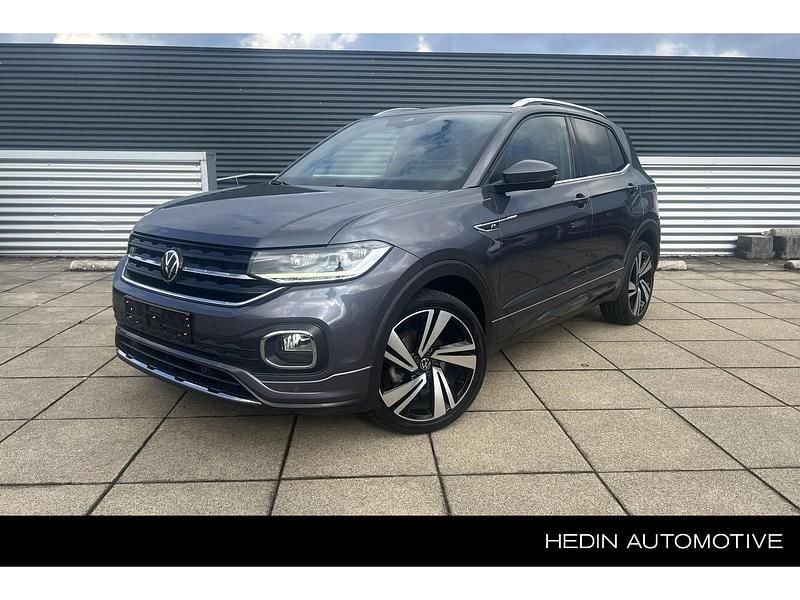 Grijs, metallic lak Gebruikt 2022 VW T-Cross R-line SUV | € 27.495 (Eerlijke prijs) - Afbeelding 1/3
