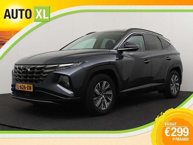 Grijs Gebruikt 2021 Hyundai Tucson Comfort SUV | € 23.940 (Eerlijke prijs) - Afbeelding 1/4