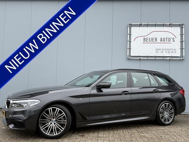 Grijs Occasion 2019 BMW 520 Executive Stationwagen | € 26.395 (Eerlijke prijs) - Afbeelding 1/4