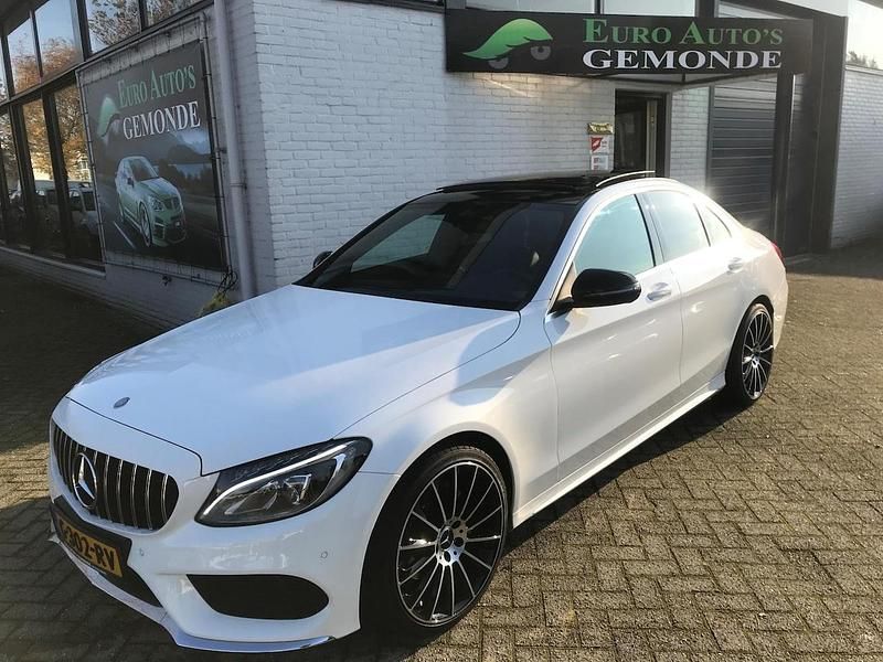 Wit (metallic) Gebruikt 2016 Mercedes C220 AMG Sedan | € 27.999 - Afbeelding 1/4