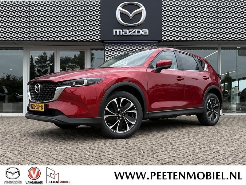 Soul red crystal metallic (46v) Gebruikt 2022 Mazda CX-5 Exclusive-Line SUV | € 32.490 (Eerlijke prijs) - Afbeelding 1/4