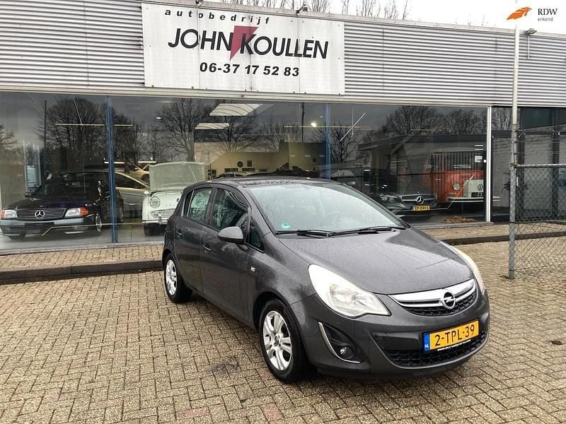 Grijs Occasion 2012 Opel Corsa Cosmo Hatchback | € 2.999 (Goede deal) - Afbeelding 1/4