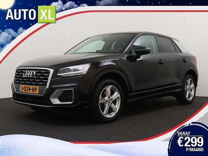 Zwart (metallic) Gebruikt 2020 Audi Q2 Sport SUV | € 19.940 (Eerlijke prijs) - Afbeelding 1/4