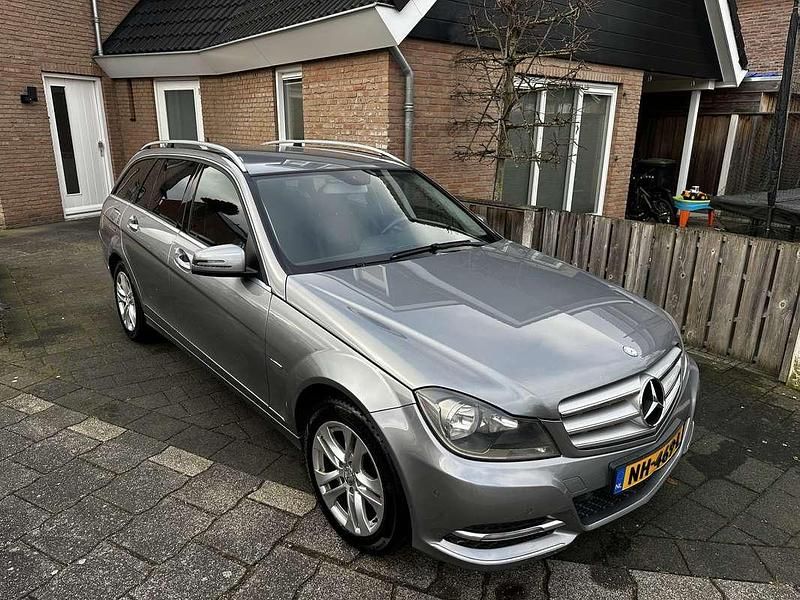 Grijs Gebruikt 2012 Mercedes C180 Stationwagen | € 5.700 (Eerlijke prijs) - Afbeelding 1/4