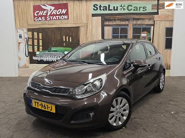 Bruin Gebruikt 2013 Kia Rio Hatchback | € 4.950 (Eerlijke prijs) - Afbeelding 1/3