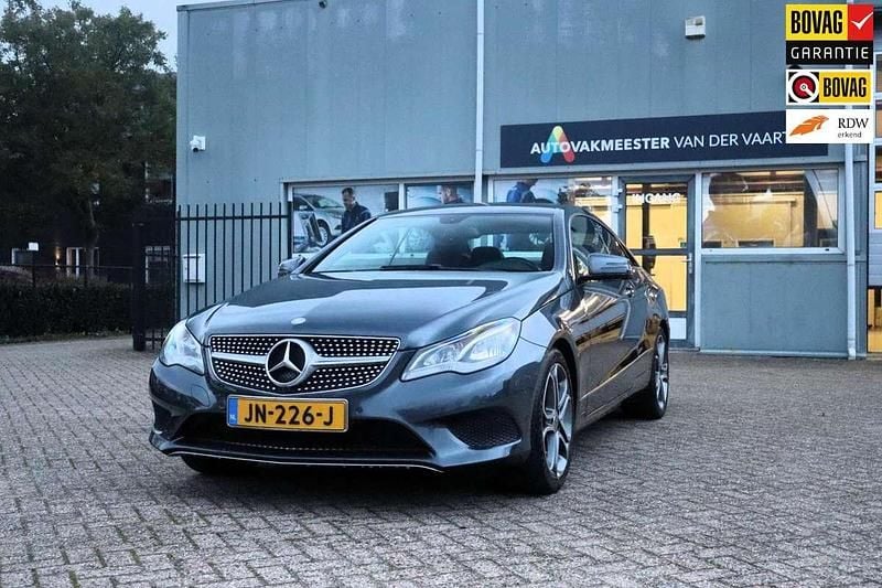 Grijs Gebruikt 2014 Mercedes E200 Ambition Coupé | € 19.950 (Eerlijke prijs) - Afbeelding 1/4
