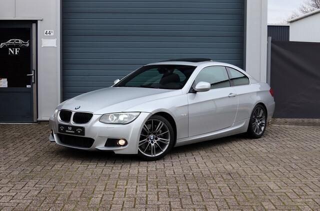 Grijs Gebruikt 2010 BMW 335 M Sport Coupé | € 19.950 - Afbeelding 1/4