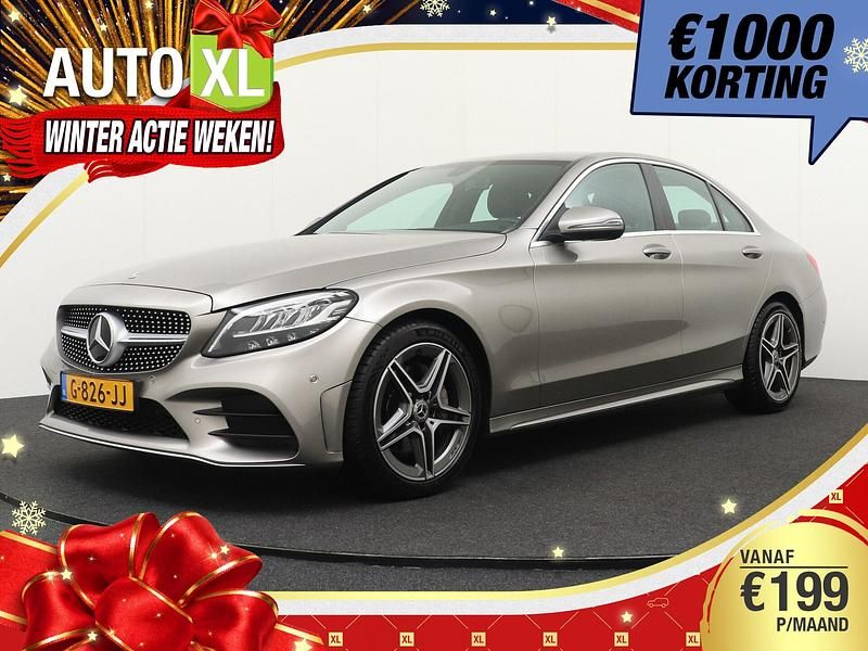 Grijs (metallic) Gebruikt 2019 Mercedes C180 AMG line Sedan | € 25.940 (Eerlijke prijs) - Afbeelding 1/4