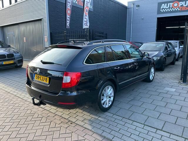 Occasion Skoda Superb Business Line 161 PK (118 kW) 2010 Zwart Stationwagen