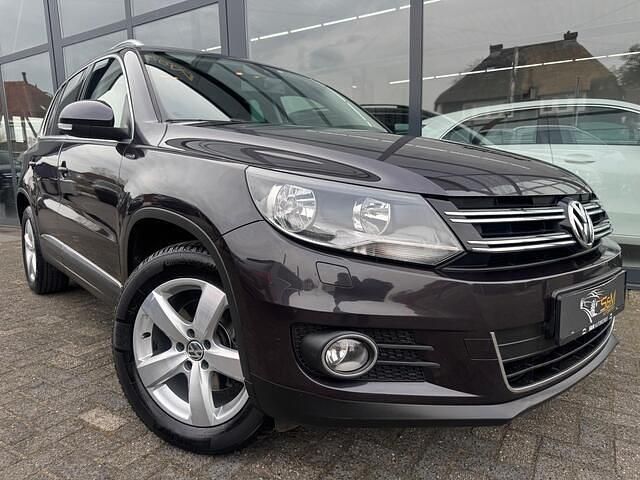 Grijs (metallic) Occasion 2015 VW Tiguan LOUNGE SUV | € 13.950 (Goede deal) - Afbeelding 1/4