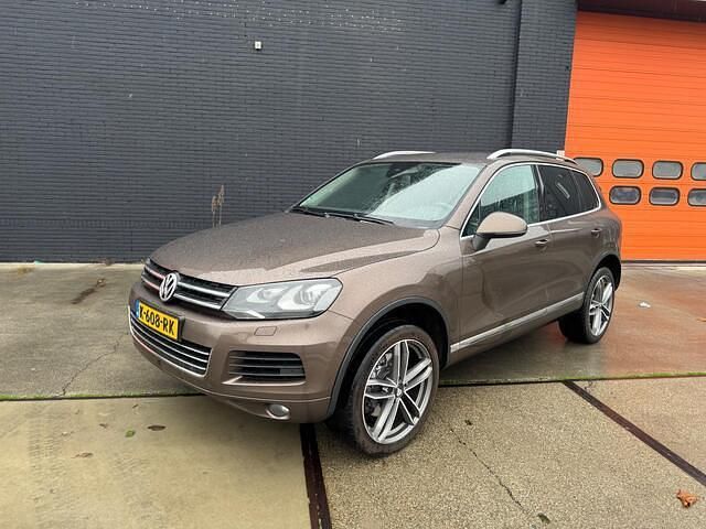 Bruin Gebruikt 2011 VW Touareg SUV | € 11.950 - Afbeelding 1/4