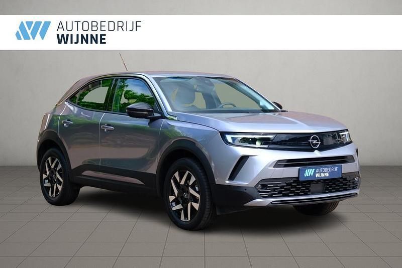 Grijs Gebruikt 2024 Opel Mokka Elegance SUV | € 24.950 (Eerlijke prijs) - Afbeelding 1/4