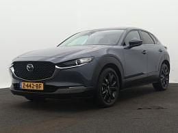Polymetal grey (grijs metallic) Gebruikt 2024 Mazda CX-30 Homura-Line SUV | € 33.945 (Iets duurder) - Afbeelding 1/3