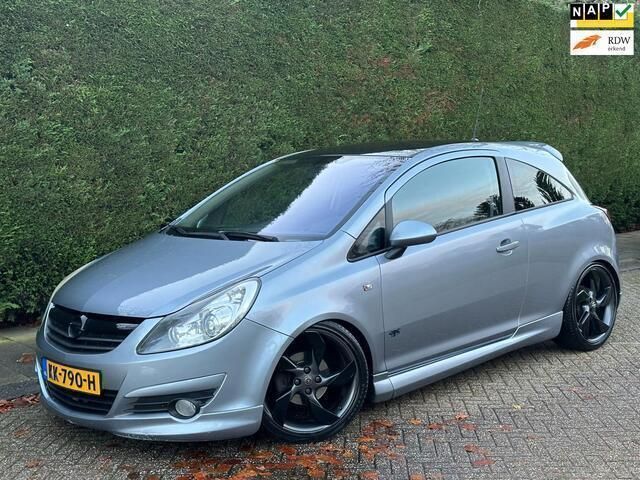 Grijs Gebruikt 2009 Opel Corsa Color Edition Hatchback | € 3.500 (Iets duurder) - Afbeelding 1/4