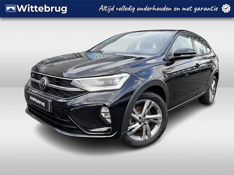 Zwart Gebruikt 2022 VW Taigo R-line SUV | € 28.950 (Eerlijke prijs) - Afbeelding 1/2