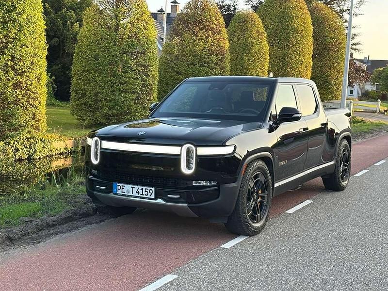 Zwart Occasion 2022 Rivian R1T Pickup | € 89.990 - Afbeelding 1/4