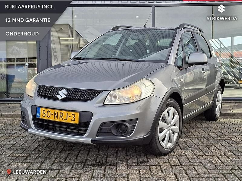 Grijs Gebruikt 2010 Suzuki SX4 Comfort MPV | € 9.400 (Eerlijke prijs) - Afbeelding 1/4