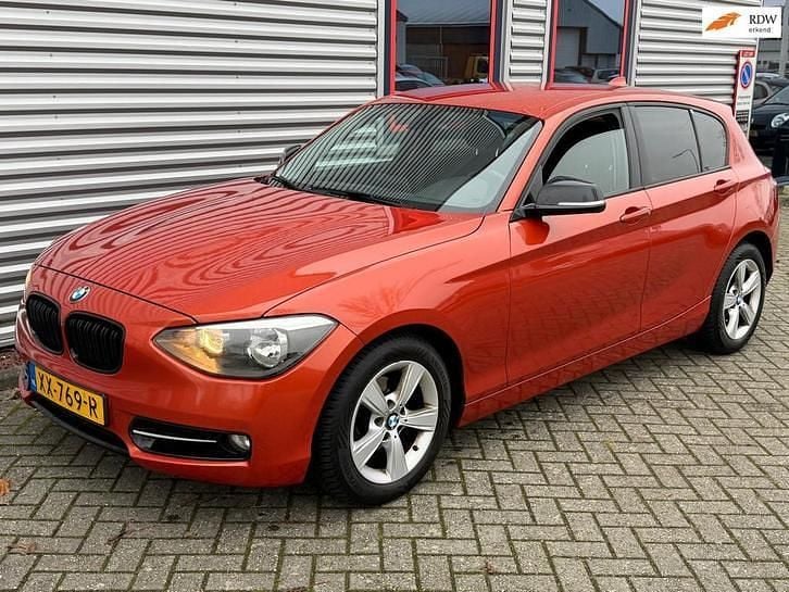 Oranje Gebruikt 2014 BMW 118 Executive Hatchback | € 5.999 (Super prijs) - Afbeelding 1/4
